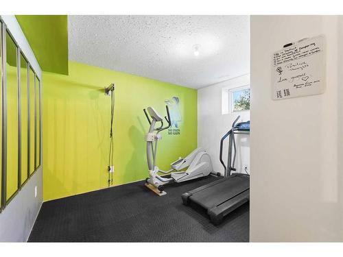 1523 New Brighton Drive Se, Calgary, AB - Indoor Photo Showing Gym Room