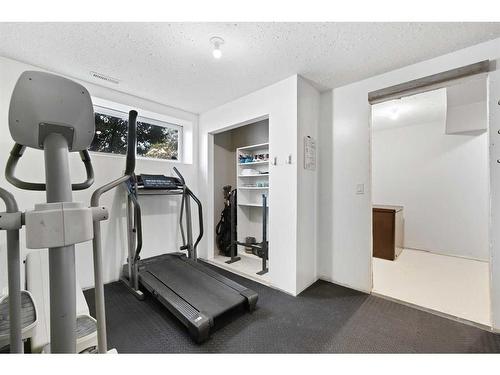 1523 New Brighton Drive Se, Calgary, AB - Indoor Photo Showing Gym Room