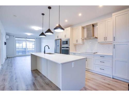 314-10 Sage Hill Nw, Calgary, AB - Indoor Photo Showing Kitchen With Upgraded Kitchen