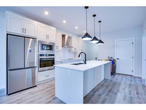 314-10 Sage Hill Nw, Calgary, AB - Indoor Photo Showing Kitchen With Stainless Steel Kitchen With Double Sink With Upgraded Kitchen