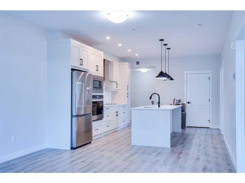 314-10 Sage Hill Nw, Calgary, AB - Indoor Photo Showing Kitchen With Stainless Steel Kitchen