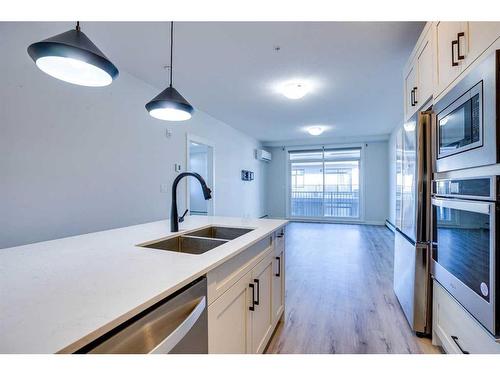 314-10 Sage Hill Nw, Calgary, AB - Indoor Photo Showing Kitchen With Double Sink With Upgraded Kitchen