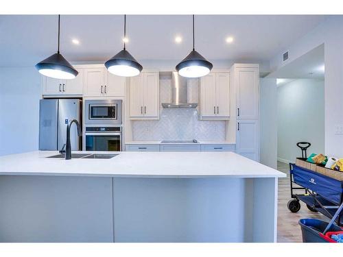 314-10 Sage Hill Nw, Calgary, AB - Indoor Photo Showing Kitchen With Double Sink With Upgraded Kitchen