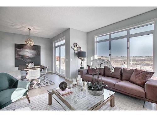 91 Waterford Manor, Chestermere, AB - Indoor Photo Showing Living Room