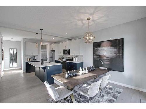 91 Waterford Manor, Chestermere, AB - Indoor Photo Showing Dining Room