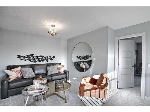 91 Waterford Manor, Chestermere, AB - Indoor Photo Showing Living Room