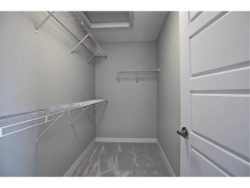 91 Waterford Manor, Chestermere, AB - Indoor With Storage