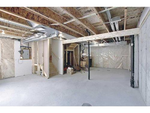 91 Waterford Manor, Chestermere, AB - Indoor Photo Showing Basement