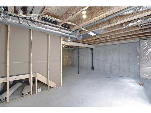 91 Waterford Manor, Chestermere, AB - Indoor Photo Showing Basement