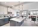 91 Waterford Manor, Chestermere, AB  - Indoor Photo Showing Kitchen With Double Sink With Upgraded Kitchen 