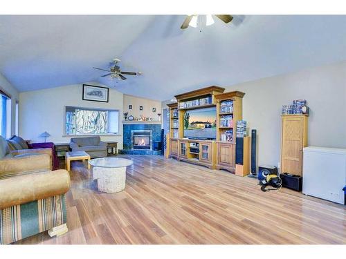 3235 100 Street Se, Calgary, AB - Indoor Photo Showing Living Room With Fireplace