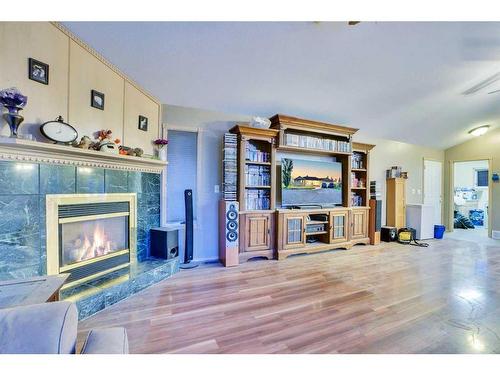 3235 100 Street Se, Calgary, AB - Indoor Photo Showing Other Room With Fireplace