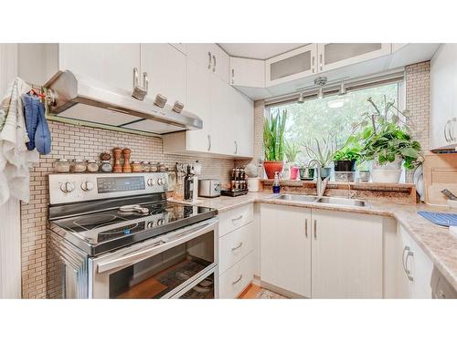 5215 8 Avenue Sw, Calgary, AB - Indoor Photo Showing Kitchen With Double Sink