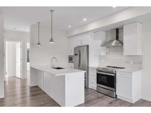 616 Greenbriar Common Nw, Calgary, AB - Indoor Photo Showing Kitchen With Stainless Steel Kitchen With Upgraded Kitchen