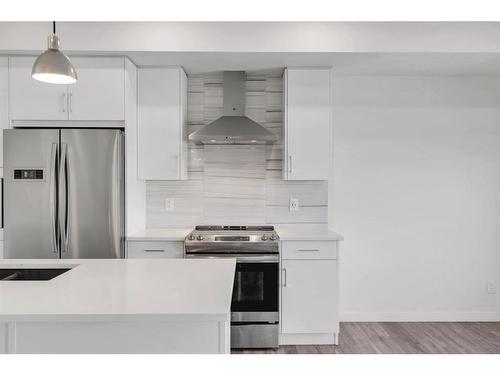 616 Greenbriar Common Nw, Calgary, AB - Indoor Photo Showing Kitchen With Stainless Steel Kitchen With Upgraded Kitchen