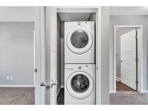 81 Nolanlake Cove Nw, Calgary, AB - Indoor Photo Showing Laundry Room