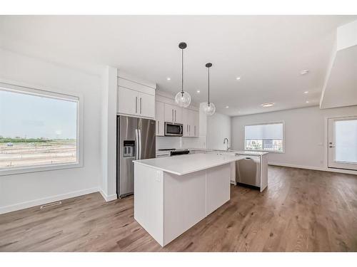 605-280 Chelsea Road, Chestermere, AB - Indoor Photo Showing Kitchen With Upgraded Kitchen