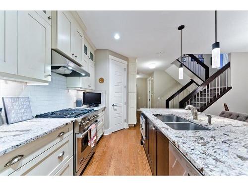 2416 26 Avenue Nw, Calgary, AB - Indoor Photo Showing Kitchen With Double Sink With Upgraded Kitchen