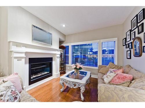 2416 26 Avenue Nw, Calgary, AB - Indoor Photo Showing Living Room With Fireplace