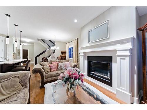 2416 26 Avenue Nw, Calgary, AB - Indoor Photo Showing Living Room With Fireplace