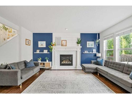 15 Mahogany Point Se, Calgary, AB - Indoor Photo Showing Living Room With Fireplace