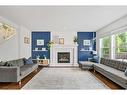 15 Mahogany Point Se, Calgary, AB  - Indoor Photo Showing Living Room With Fireplace 