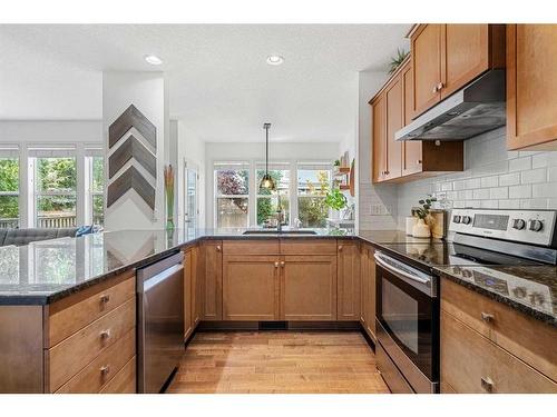 15 Mahogany Point Se, Calgary, AB - Indoor Photo Showing Kitchen With Stainless Steel Kitchen With Upgraded Kitchen