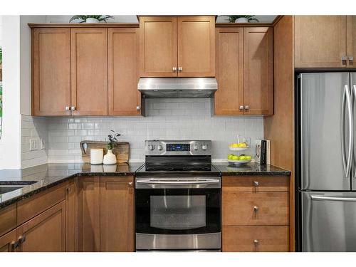 15 Mahogany Point Se, Calgary, AB - Indoor Photo Showing Kitchen With Stainless Steel Kitchen