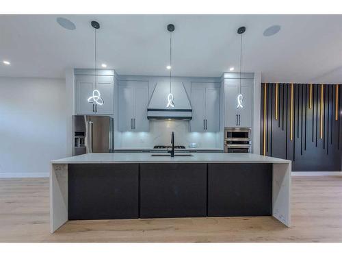 107 Hartford Road Nw, Calgary, AB - Indoor Photo Showing Kitchen With Upgraded Kitchen