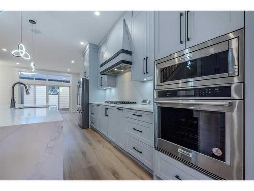 107 Hartford Road Nw, Calgary, AB - Indoor Photo Showing Kitchen With Stainless Steel Kitchen With Upgraded Kitchen