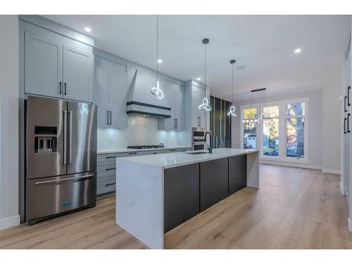 107 Hartford Road Nw, Calgary, AB - Indoor Photo Showing Kitchen With Stainless Steel Kitchen With Upgraded Kitchen