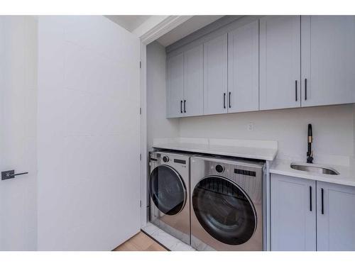 107 Hartford Road Nw, Calgary, AB - Indoor Photo Showing Laundry Room