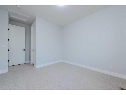 107 Hartford Road Nw, Calgary, AB - Indoor Photo Showing Other Room