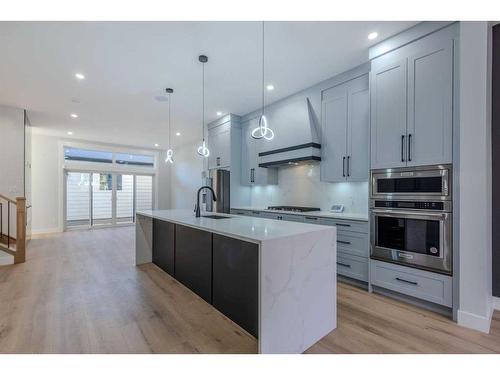 107 Hartford Road Nw, Calgary, AB - Indoor Photo Showing Kitchen With Upgraded Kitchen