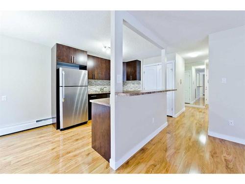 203-616 15 Avenue Sw, Calgary, AB - Indoor Photo Showing Kitchen