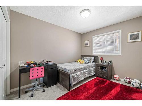 78 Cranston Drive Se, Calgary, AB - Indoor Photo Showing Bedroom