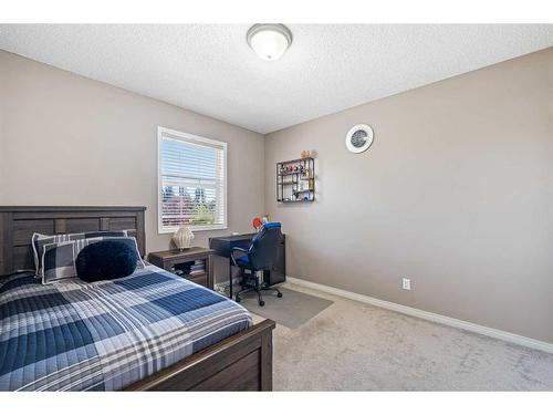 78 Cranston Drive Se, Calgary, AB - Indoor Photo Showing Bedroom