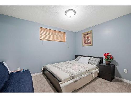 78 Cranston Drive Se, Calgary, AB - Indoor Photo Showing Bedroom