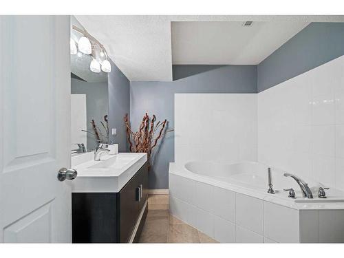 78 Cranston Drive Se, Calgary, AB - Indoor Photo Showing Bathroom