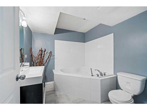 78 Cranston Drive Se, Calgary, AB - Indoor Photo Showing Bathroom