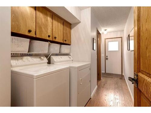 41 Strabane Place Sw, Calgary, AB - Indoor Photo Showing Laundry Room