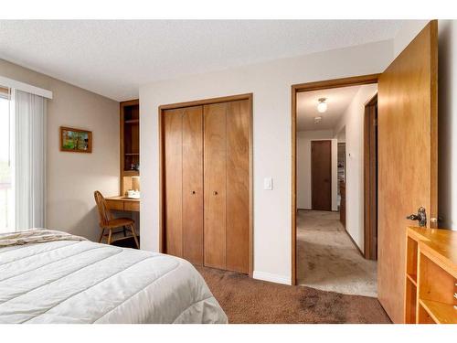 41 Strabane Place Sw, Calgary, AB - Indoor Photo Showing Bedroom