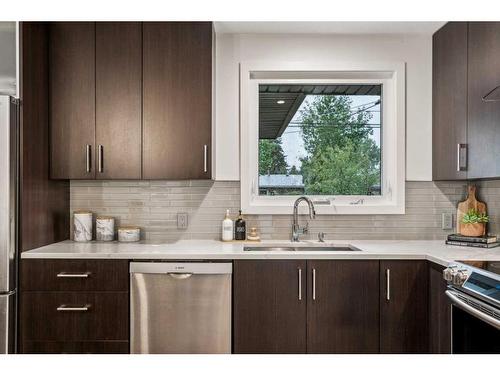 10823 Mapleshire Crescent Se, Calgary, AB - Indoor Photo Showing Kitchen With Double Sink With Upgraded Kitchen