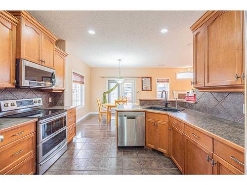 3 Saddleland Crescent Ne, Calgary, AB - Indoor Photo Showing Kitchen With Stainless Steel Kitchen With Double Sink