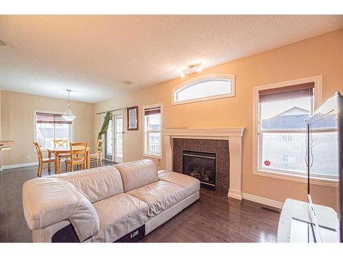 3 Saddleland Crescent Ne, Calgary, AB - Indoor Photo Showing Living Room With Fireplace