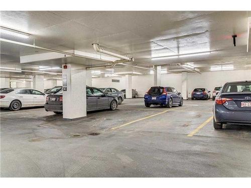 1005-225 11 Avenue Se, Calgary, AB - Indoor Photo Showing Garage