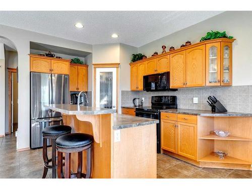 408 Bridlemeadows Common Sw, Calgary, AB - Indoor Photo Showing Kitchen With Double Sink