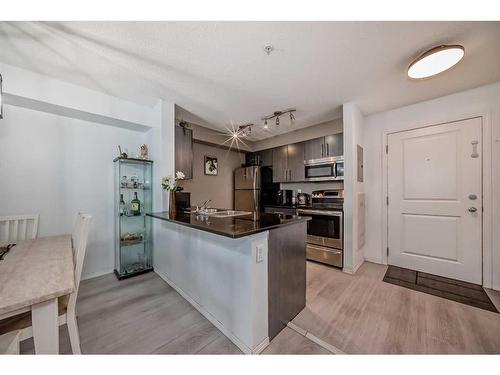 216-5 Saddlestone Way Ne, Calgary, AB - Indoor Photo Showing Kitchen