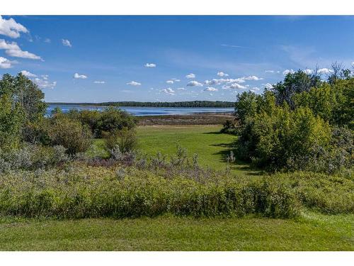 602 Pheasant Close, Pelican Point, AB - Outdoor With Body Of Water With View