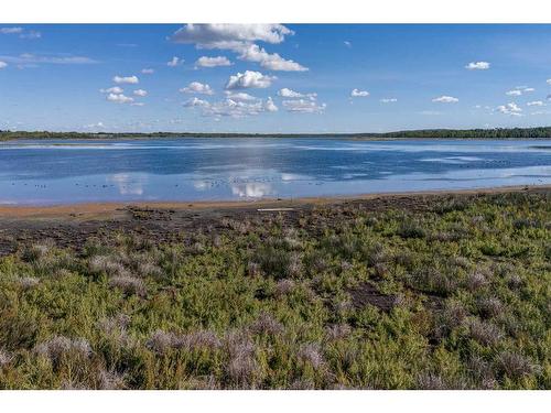 602 Pheasant Close, Pelican Point, AB - Outdoor With Body Of Water With View